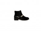 ‘Chelsea boots’ con catena