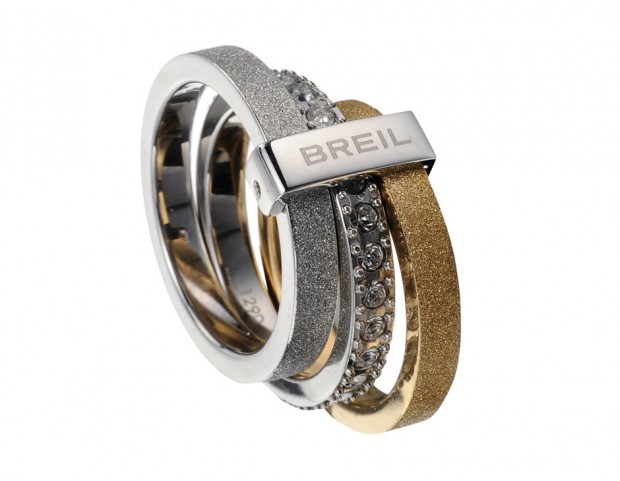 Breilogy, fedine in acciaio lucido con cristalli bianchi e finiture diamantate legate da una fascetta in acciaio