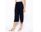 Pantaloni “midi” a palazzo