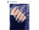 Dark manicure con fiocchetto