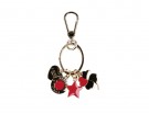 Portachiavi con charms in metallo dorato e colorato