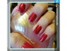 Marble nail art con diversi toni di rosso