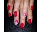 Manicure floreale rossa e rosa