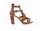Alti in suede con cinturini e frange