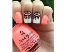 Nail art tribale sui toni del corallo