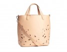 In pelle con laserature