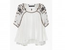 Blusa con ricami folk