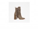Stivaletti con tacco e frange in suede