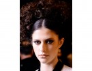 Acconciatura per capelli ricci medi o lunghi