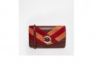 Pochette geometrica con inserti in suede