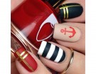 Rosso, nero, bianco e oro per la nail art