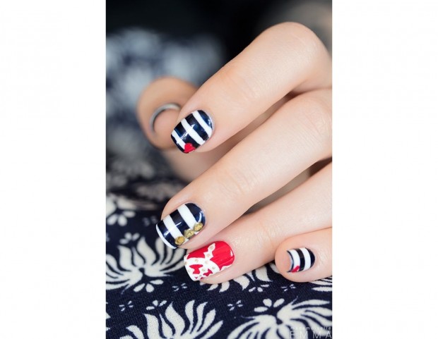 Accenti nei toni del rosso vivo per la nail art