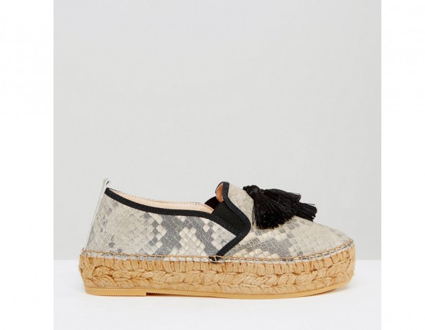 In pelle effetto snake con nappine