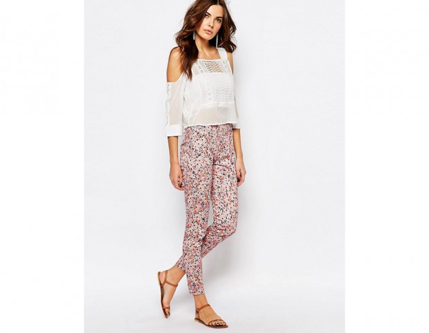Pantaloni skinny con margherite stampate