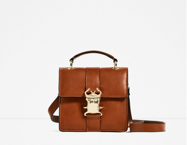 Borsa compatta con chiusura in metallo