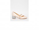 Pumps di vernice con tacco glitter