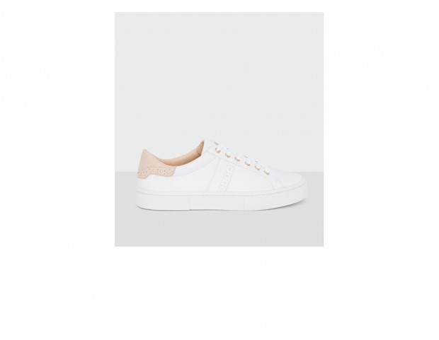 Sneakers bicolor con forellini