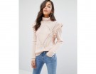 Pullover con volant