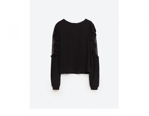 Blusa con volant e inserti in pizzo