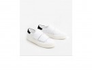 Sneakers bianche con velcro
