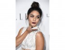 Un top-knot informale per Vanessa Hudgens.  (Photo credit: Getty Images)