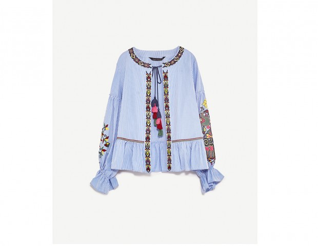 Giacca con ricami e pom-pom