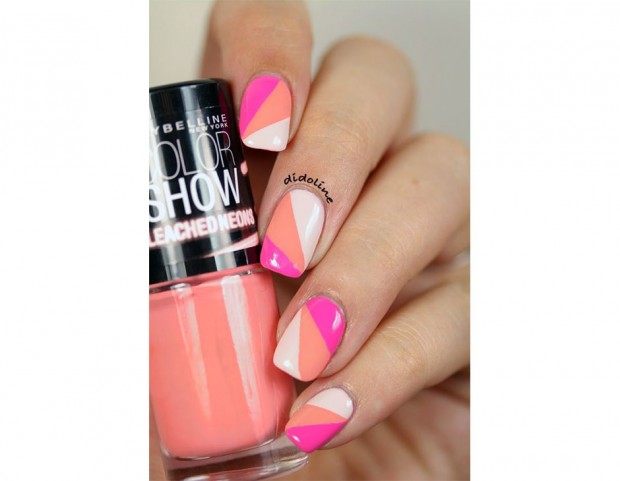 Nail art corallo geometrica abbinata al fucsia. (Photo credit: Instagram @didoline)