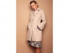 Cappotto con pinces e volant sulle maniche
