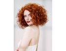 Capelli medi – ricci voluminosi (Photo credit: Indola)