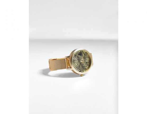 Orologio con le palme nel quadrante