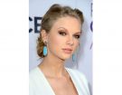Taylor Swift con uno smokey eyes rame. (Photo credit: Getty Images)