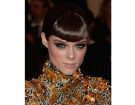 Smokey eyes metallizzato color rame, oro e argento. (Photo credit: Getty Images)