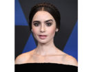 Raccolto elegantissimo con treccia a corona per Lily Collins. Photo credit: Getty Images