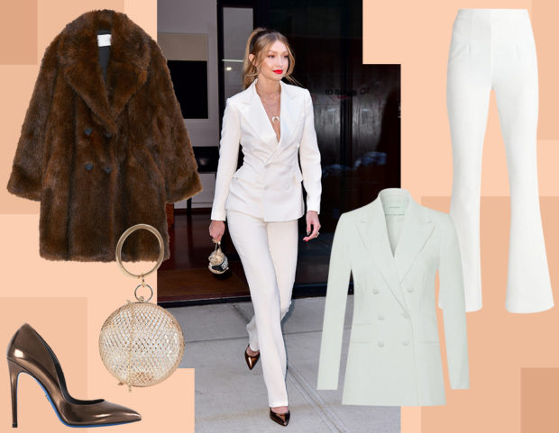 Gigi Hadid in tailleur bianco e pumps metallizzate di Loriblu